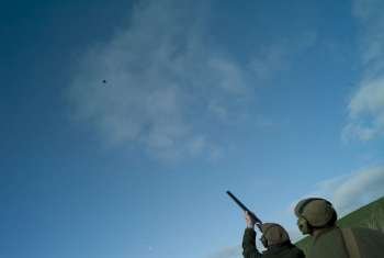 Men shooting grouse, Berwickshire, Scotland