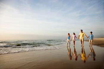 Family Walking on Beach