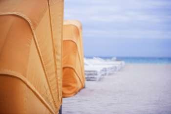 Close-up of tents on the beach