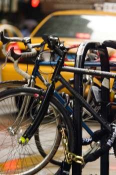 Close-up of bicycles parked at a bike rack, Chicago, Illinois, USA