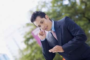 Businessman talking on a hands free device