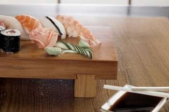 Close-up of sushi and fish on a table