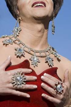 Close-up of a gay man wearing jewelry