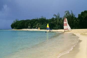 Sail boats are seen at a seashore near Sandy Lane Hotel Beach, Barbados, Caribbean