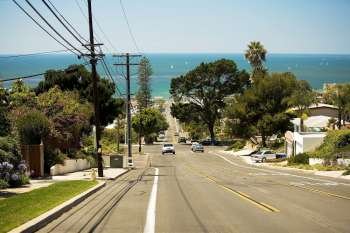 Rear view of cars driving on a street on Coronado Island, San Diego, California, USA
