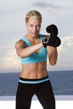 Young woman boxing