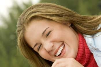 Close-up of a teenage girl laughing