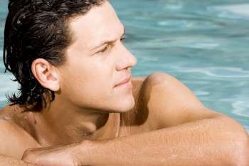 Close-up of a young man in a swimming pool