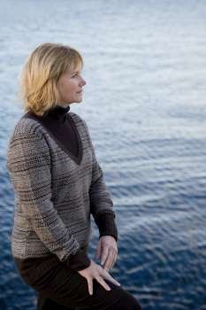 Side profile of a mature woman thinking at the seaside