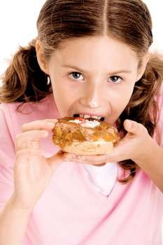 Portrait of a girl eating a donut