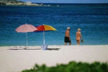 Rear view of a senior couple on a beach, Sunset & Nude Beach, Virgin Islands