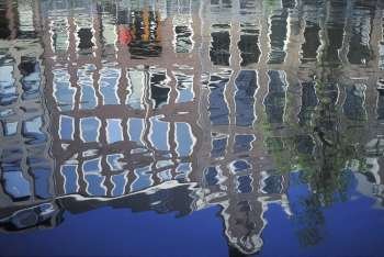 Reflection of buildings in water, Amsterdam, Netherlands