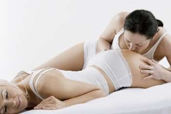 Female homosexual couple doing sexual activity