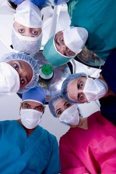 Low angle view of surgeons in an operating room