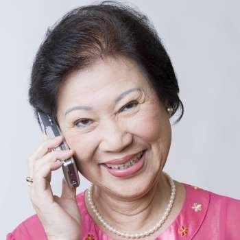 Portrait of a senior woman talking on a mobile phone and smiling