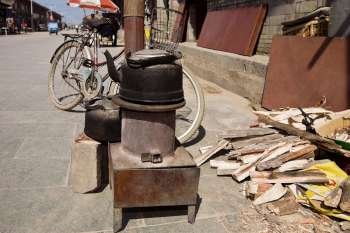 Traditional stove and a kettle at the roadside, HohHot, Inner Mongolia, China