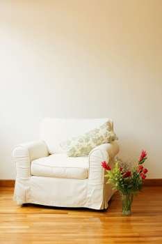 Armchair with a flower vase