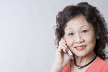Portrait of a senior woman talking on a mobile phone and smiling