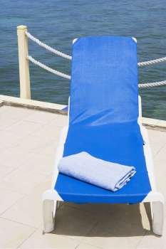 High angle view of a towel on a lounge chair