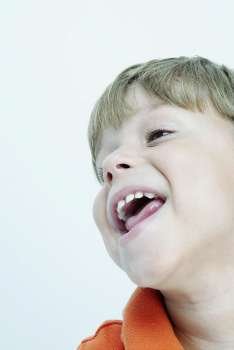 Close-up of a boy laughing