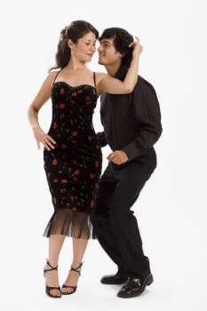 Studio portrait of couple dancing