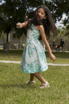 Girl dancing in a park