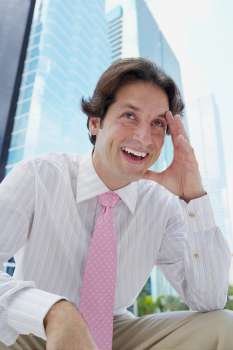 Low angle view of a businessman smiling