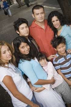 Group portrait of family in urban setting, Los Angeles, California
