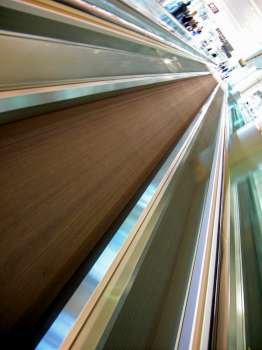 Abstract view of airport moving sidewalk.