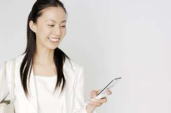 Business lady checking email of cell phone
