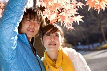 Smiling Japanese teenage couple