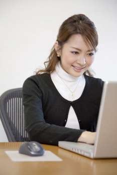 Japanese office lady operating a PC