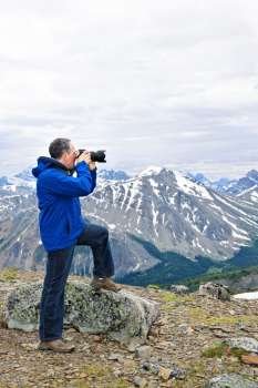 Photographer in mountains