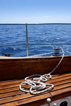 wooden sailboat boat deck blue sky ocean mediterranean sea
