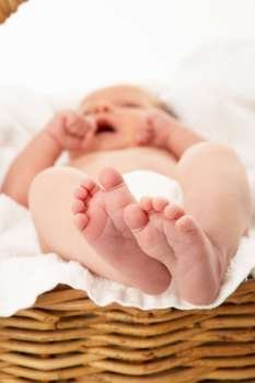 Close Up Of Baby´s Feet On Towel