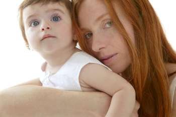 baby brunette and redhead mother love hug on white