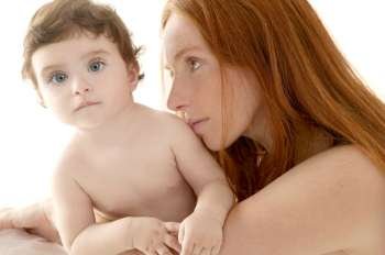 nude baby and mother portrait hug playing white background