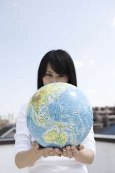 A Female with the globe