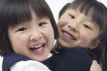 two children smiling