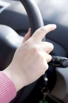 hands driving with wheel