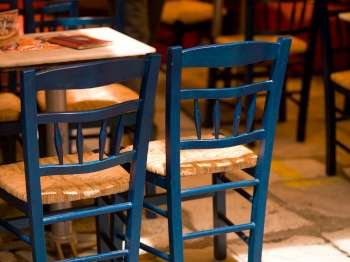 Empty restaurant chairs in Athens Greece