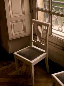 Chair in front of window