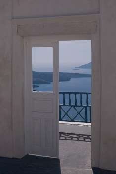 Ocean view through doorway in Santorini Greece