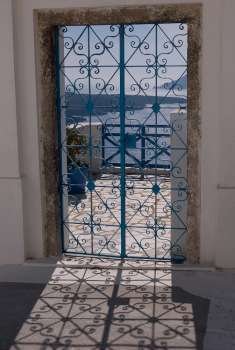 Ocean view through doorway in Santorini Greece