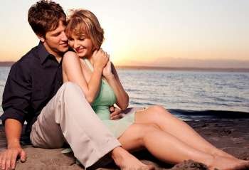 A romantic caucasian couple in love on the beach