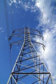 electric mast pole tower pilot on blue cloud sky cables