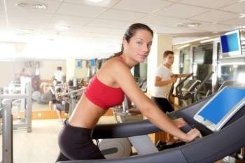 Gym treadmill running young woman interior monitor screen