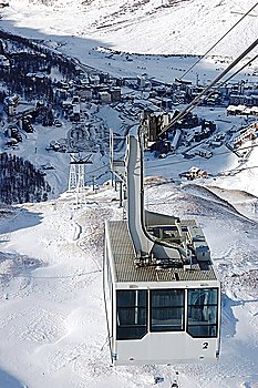 Cervinia mountain resort cable car (Italy); winter season; vertical orientation