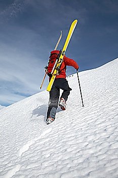 Ski-Climber on a snowy ridge, Italian alps.