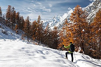 Hiker in a winter mountain landscape, Mont Blanc, Italy
